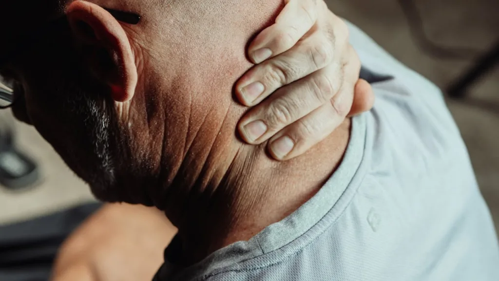 man with neck pain