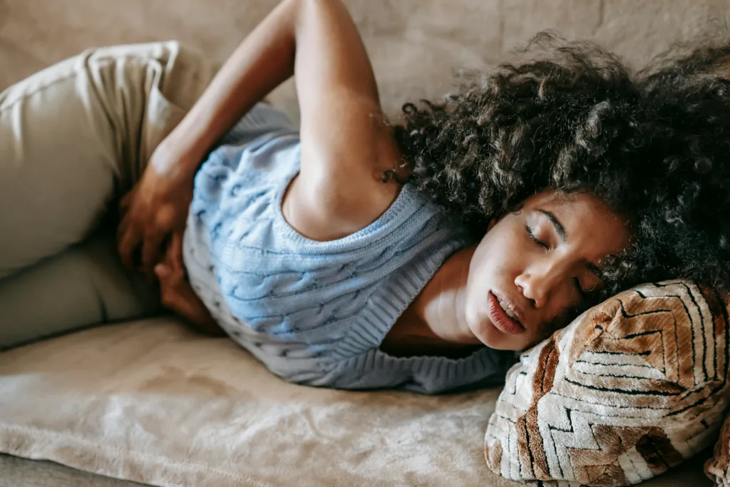 woman experiencing painful menstrual cramps